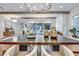 Dining area view with statement lighting and views into the living room and outdoor deck at 2171 James Aly, Atlanta, GA 30345
