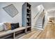 Inviting entryway featuring a built-in bench, storage, and a staircase at 2171 James Aly, Atlanta, GA 30345
