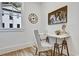 Bright home office with a minimalist desk, decor, and natural light from the window at 2171 James Aly, Atlanta, GA 30345