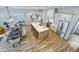 Aerial view of a modern kitchen with a large island, stainless steel appliances and hardwood floors at 2171 James Aly, Atlanta, GA 30345