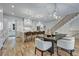 Gourmet kitchen with large island, stainless steel appliances, and adjacent dining area at 2171 James Aly, Atlanta, GA 30345
