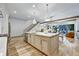Open kitchen featuring a large island, modern appliances, and an adjacent living area at 2171 James Aly, Atlanta, GA 30345