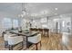 Bright kitchen featuring a large island, stainless appliances and dining area with stylish seating at 2171 James Aly, Atlanta, GA 30345