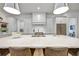 Gourmet kitchen with a large island, stainless steel appliances, and pendant lighting at 2171 James Aly, Atlanta, GA 30345