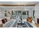 Living room featuring hardwood floors, modern lighting, and sliding glass doors to the outdoor deck at 2171 James Aly, Atlanta, GA 30345