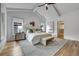 Inviting main bedroom with large windows, a stylish bench, and a walk-in closet at 2171 James Aly, Atlanta, GA 30345