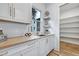Spacious pantry with ample shelving for storage at 2171 James Aly, Atlanta, GA 30345