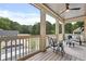 Relaxing screened-in porch with seating, a ceiling fan, and a view of the lush backyard at 2171 James Aly, Atlanta, GA 30345