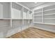 Spacious walk-in closet with custom shelving and ample hanging space for clothes and accessories at 2171 James Aly, Atlanta, GA 30345