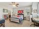 Bedroom with a desk, shelving, a ceiling fan, and a view of the bathroom at 4224 Dogwood Bend Park, Duluth, GA 30096