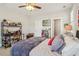Bedroom with a desk, shelving, a ceiling fan, and a view of the bathroom at 4224 Dogwood Bend Park, Duluth, GA 30096