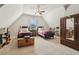 Bedroom featuring two twin beds, carpet flooring, and an armoire at 4224 Dogwood Bend Park, Duluth, GA 30096