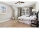 Serene bedroom with neutral walls, natural light, and comfortable bed, creating a restful atmosphere at 4224 Dogwood Bend Park, Duluth, GA 30096