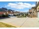 Long driveway with multiple houses, neatly landscaped yards, and mature trees at 4224 Dogwood Bend Park, Duluth, GA 30096