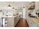 Gourmet kitchen with island, stainless appliances, and breakfast area at 4224 Dogwood Bend Park, Duluth, GA 30096