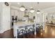 Bright kitchen island with pendant lights and seating for three at 4224 Dogwood Bend Park, Duluth, GA 30096