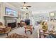 Bright living room featuring a fireplace, piano, and open layout at 4224 Dogwood Bend Park, Duluth, GA 30096