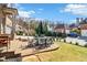 Outdoor patio with table, chairs, umbrella, and nicely manicured lawn at 4224 Dogwood Bend Park, Duluth, GA 30096