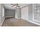 Bedroom with a ceiling fan and natural light at 4715 Old Highgate Entry, Stone Mountain, GA 30083