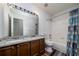 Bathroom boasts double vanity, modern fixtures, and a tub/shower combo at 900 Cherringham Ct, Alpharetta, GA 30005