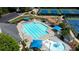 Aerial view of community pool and tennis courts at 900 Cherringham Ct, Alpharetta, GA 30005