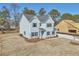 Charming two-story home with blue shutters and landscaped yard at 3725 Heron Creek Ct, Loganville, GA 30052