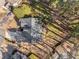 Overhead shot of the backyard featuring a large lawn with mature landscaping and a freshly sealed roof at 500 Huntgate Rd, Woodstock, GA 30189
