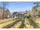 Lush backyard with ample space and mature trees at 500 Huntgate Rd, Woodstock, GA 30189