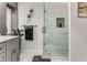The bathroom features a glass shower with white tile and a built-in niche at 500 Huntgate Rd, Woodstock, GA 30189