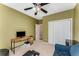 A bedroom with exercise equipment, ample space, and built-in closet at 500 Huntgate Rd, Woodstock, GA 30189