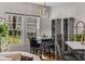Dining area featuring pendant lighting and large windows offering natural light at 500 Huntgate Rd, Woodstock, GA 30189