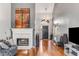 Inviting foyer with fireplace, hardwood floors, and elegant decor at 500 Huntgate Rd, Woodstock, GA 30189