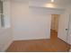 Bedroom featuring a window and door, wood floors, and light walls at 2078 Lyle Ave, College Park, GA 30337