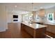 Modern kitchen featuring stainless appliances, quartz counters, a large island, and pendant lights at 2078 Lyle Ave, College Park, GA 30337