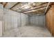 Unfinished basement with visible insulation and concrete walls, ready for customization at 4001 Oak Field Dr, Loganville, GA 30052