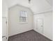 Small bedroom with carpet, a window, closet storage, and neutral walls at 4001 Oak Field Dr, Loganville, GA 30052