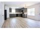 Large kitchen features gray cabinets, black appliances, and plenty of storage space at 4001 Oak Field Dr, Loganville, GA 30052
