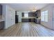 Spacious kitchen boasts gray cabinets, modern appliances, and ample counter space at 4001 Oak Field Dr, Loganville, GA 30052
