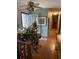 Entryway with hardwood floors and a decorative light fixture at 1040 Rolling Green Dr, Acworth, GA 30102