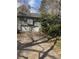 View of home's front exterior featuring a two-car garage and traditional architecture at 1040 Rolling Green Dr, Acworth, GA 30102