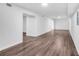 Spacious finished basement area featuring durable wood look floors and ample lighting at 2512 Hidden Hills Dr, Marietta, GA 30066