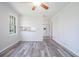 Dining area with new flooring, neutral paint, and lots of sunlight at 803 Denise Sw Ct, Stone Mountain, GA 30087