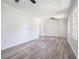 Bright living room featuring new grey tone flooring and neutral paint at 803 Denise Sw Ct, Stone Mountain, GA 30087