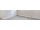Empty bedroom with light gray carpet and a double door closet at 1062 Crest Mill Dr, Marietta, GA 30008