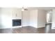 Cozy living room with hardwood floors and a modern fireplace at 1062 Crest Mill Dr, Marietta, GA 30008