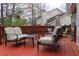 Relaxing backyard featuring a spacious deck with comfortable seating, perfect for outdoor entertaining at 3179 Dunlin Lake Rd, Lawrenceville, GA 30044