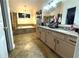 Bathroom featuring double vanities, granite countertops, soaking tub, and tiled floors at 3179 Dunlin Lake Rd, Lawrenceville, GA 30044