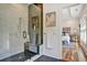 Modern bathroom features a glass shower with marble tile and views to a bedroom with hardwood floors at 2159 James Aly, Atlanta, GA 30345