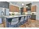 Spacious kitchen features a large island with bar seating, stainless steel appliances, and ample cabinet space at 2159 James Aly, Atlanta, GA 30345
