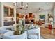 Inviting living space combines dining and living room, hardwood floors, and large windows for natural light at 2159 James Aly, Atlanta, GA 30345
